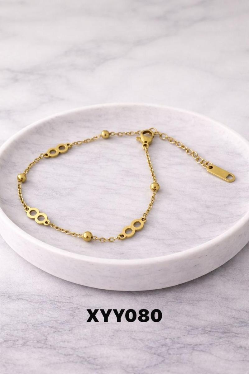 Pulsera con dijes acero dorado XYY080
