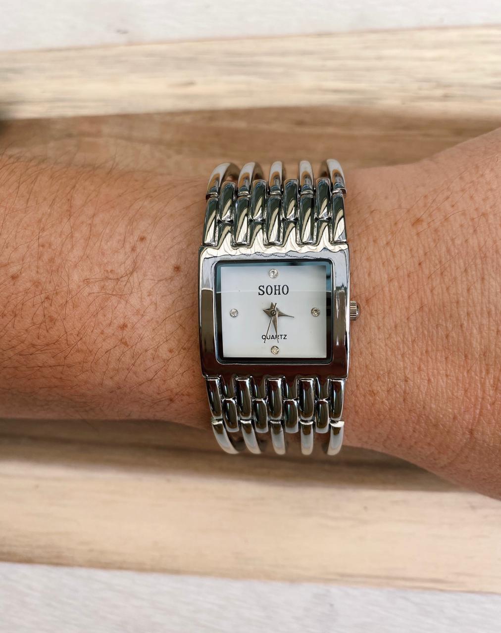 Reloj Análogo Dama CH100 Metal