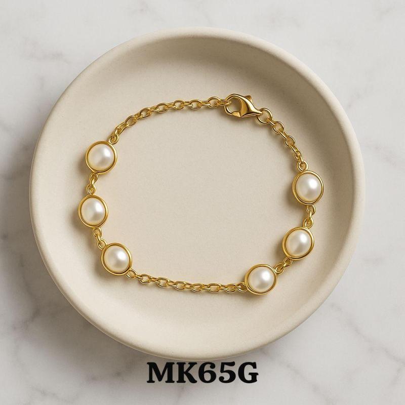 Pulsera acero dorado MK65G
