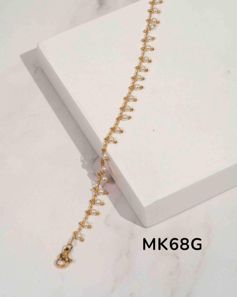 Pulsera en acero dorado MK68G