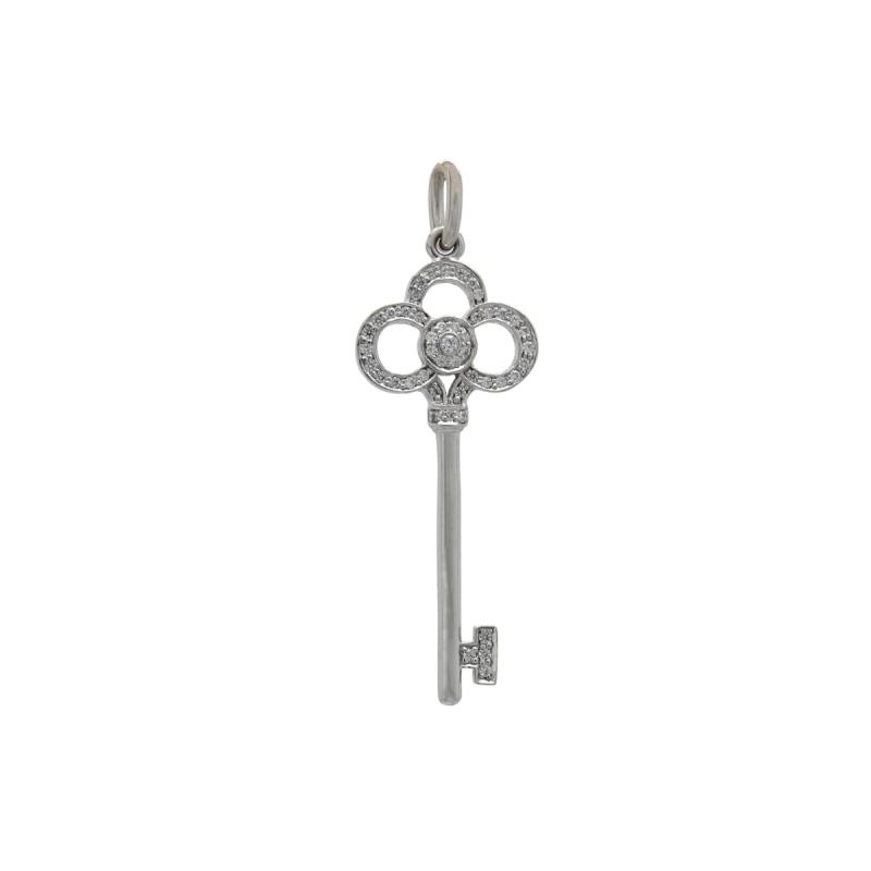 dije oro 18 kilates- llave con brillantes