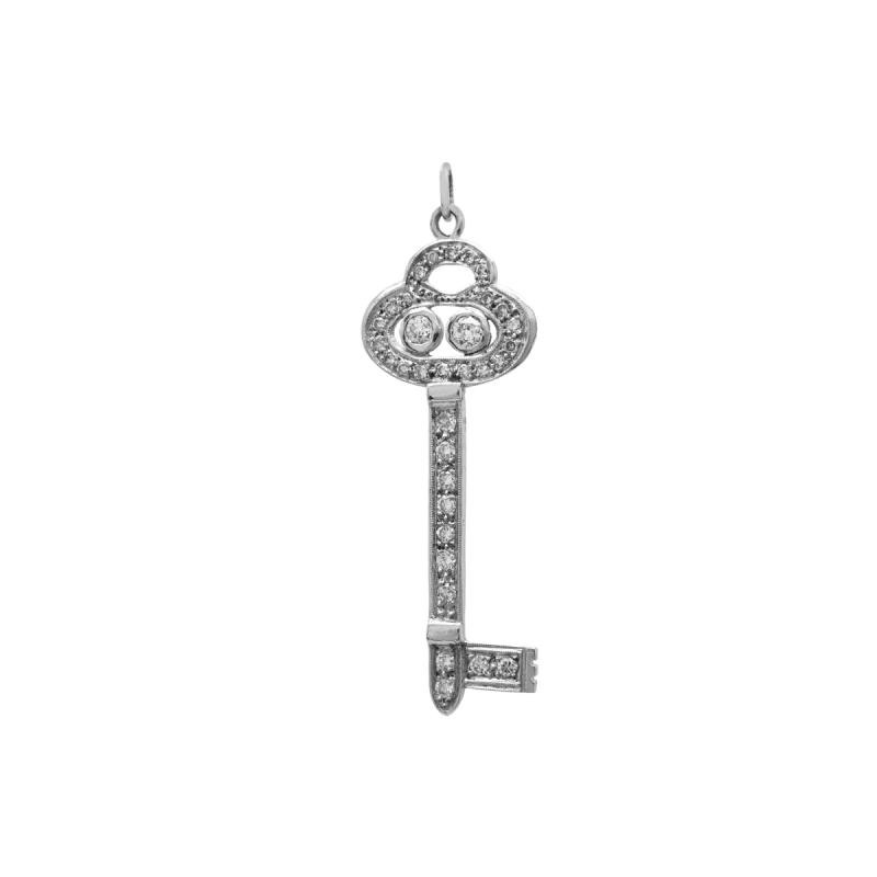 dije oro 18 kilates- llave con brillantes
