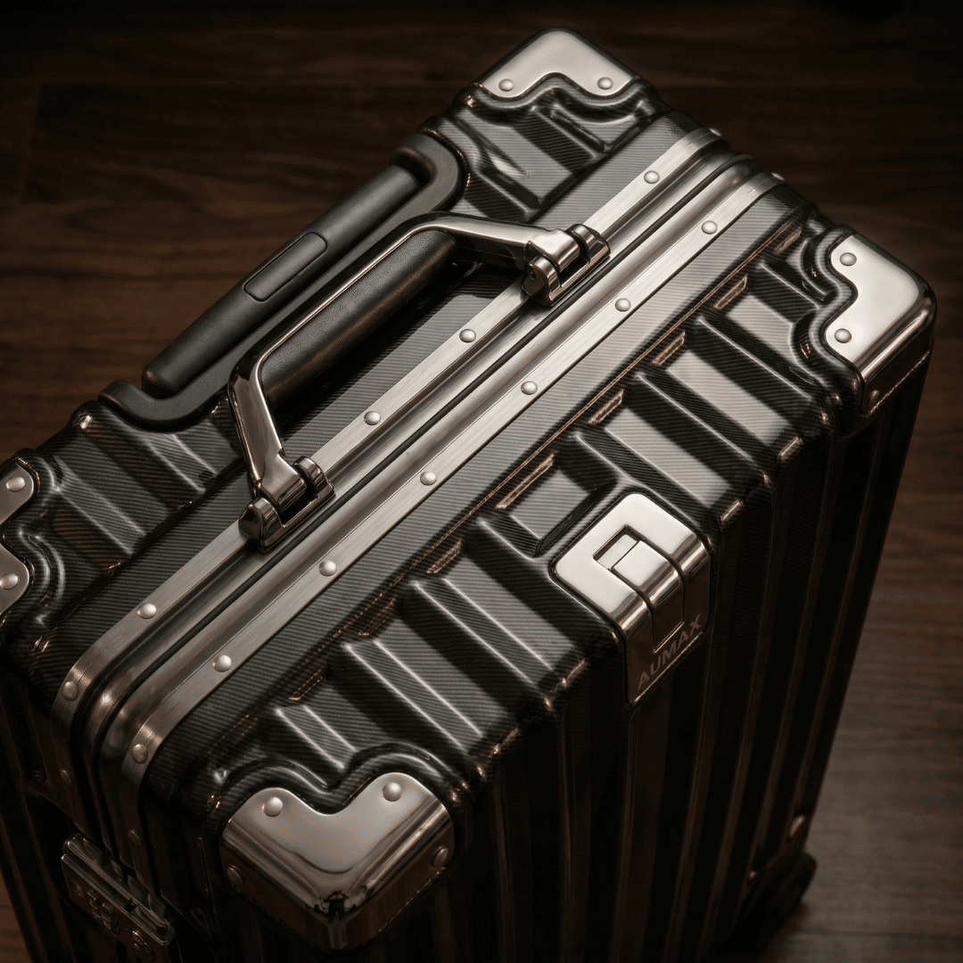 VALIJA AUMAX LUXOR BLACK / GUNMETAL CABINA 20" MARCO ALUMINIO DOBLE TSA