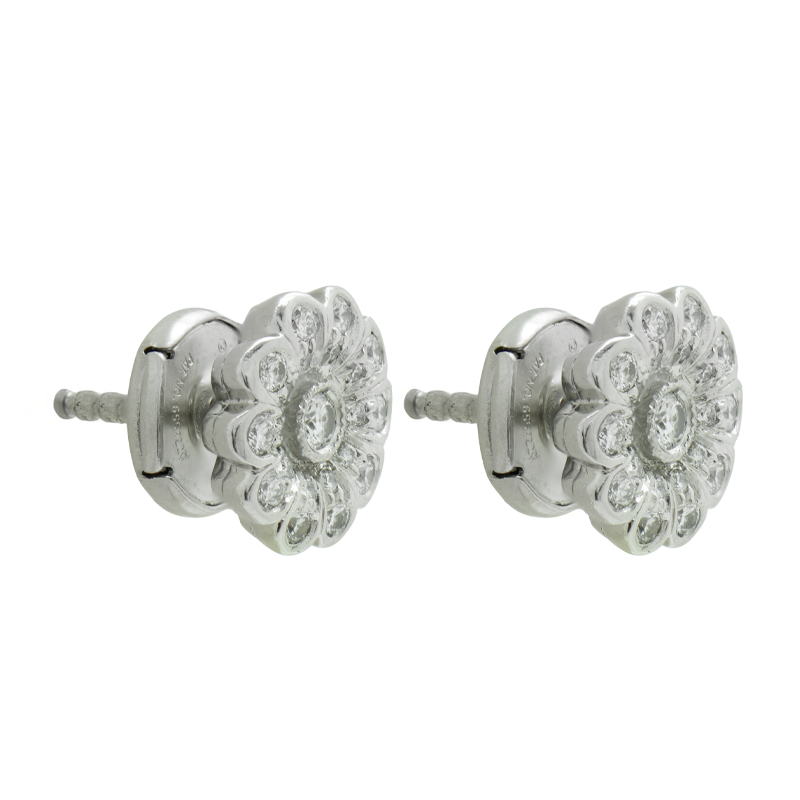 AROS DE FLOR, CON BRILLANTES, EN ORO BLANCO - 18 KTS.