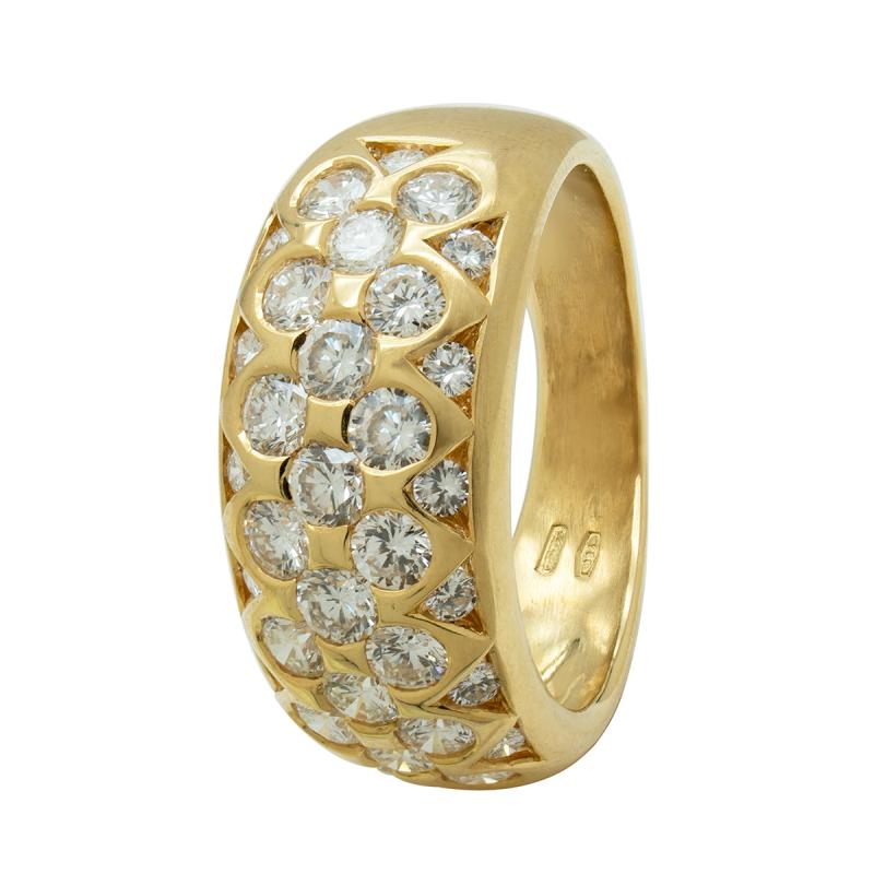 ANILLO ANCHO CON FRENDE DE BRILLANTES - 18 KTS.