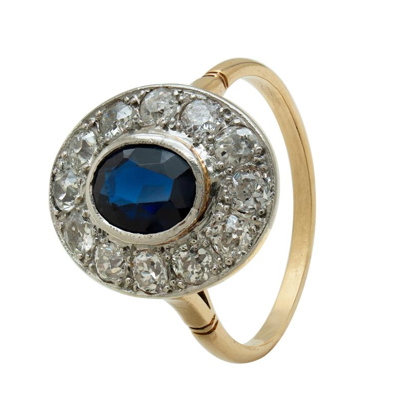 ANILLO COMBINADO CON BRILLANTES Y ZAFIRO CENTRAL - 18 KTS.