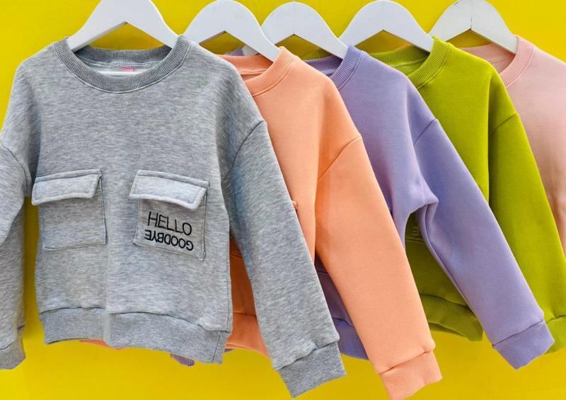 RYM BUZO HELLO OVERSIZE FRENTE CARGO W24