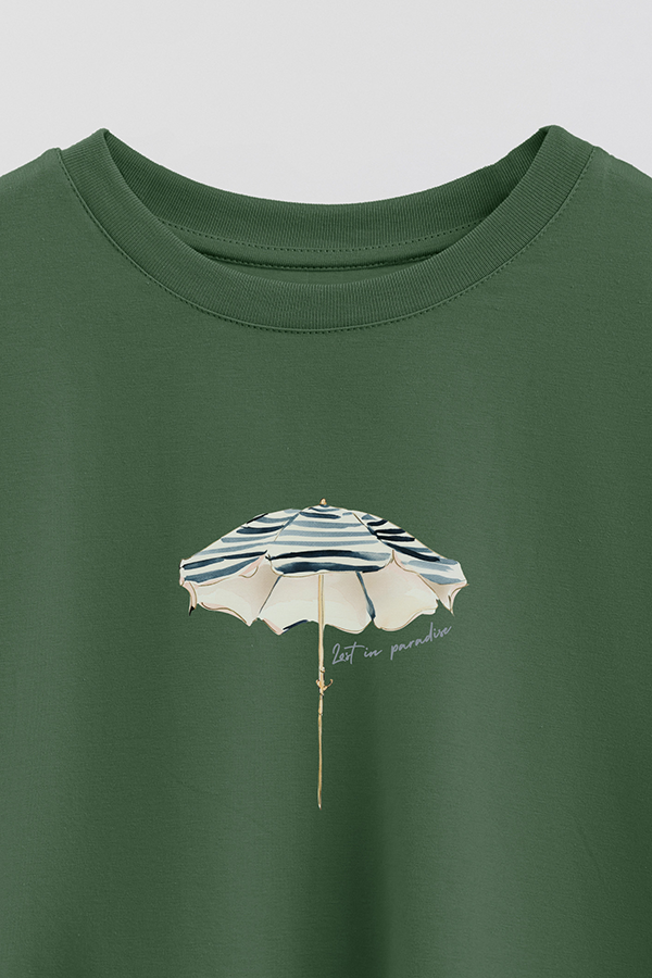 REMERA CROP ESTAMPADA COASTAL LOST IN PARADISE