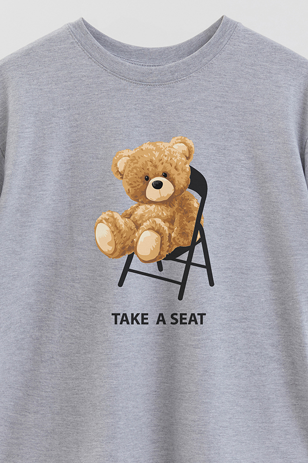 REMERA OVER ESTAMPADA UNISEX TAKE A SEAT