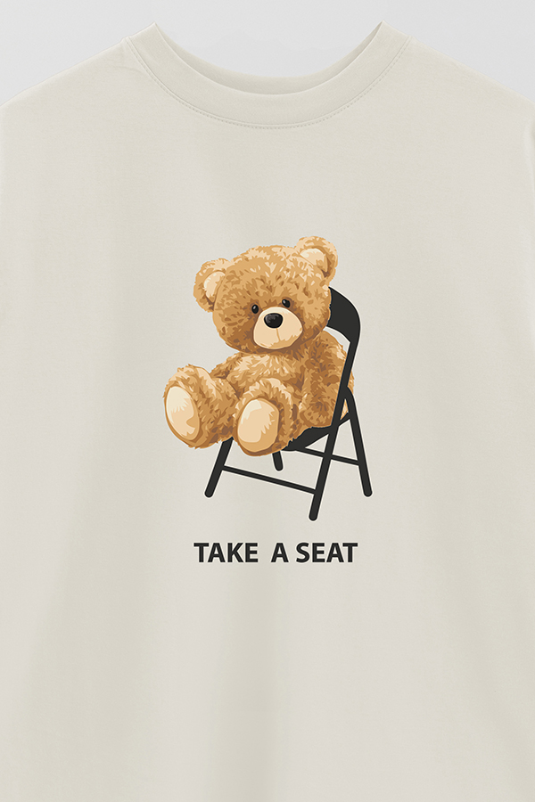 REMERA OVER ESTAMPADA UNISEX TAKE A SEAT