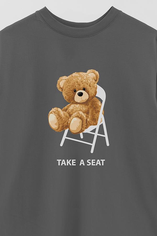 REMERA OVER ESTAMPADA UNISEX TAKE A SEAT