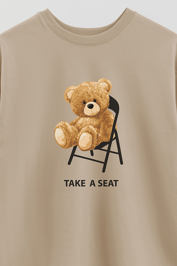 REMERA OVER ESTAMPADA UNISEX TAKE A SEAT