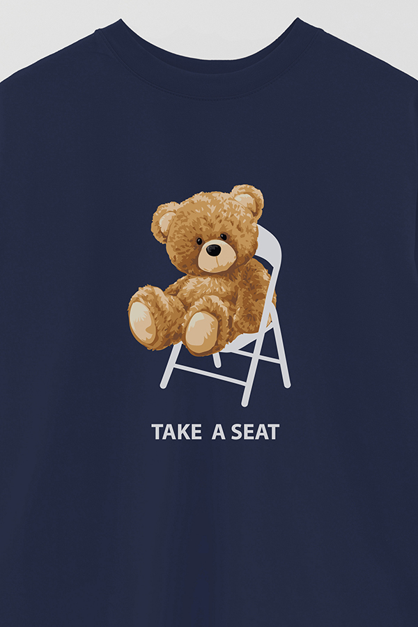 REMERA OVER ESTAMPADA UNISEX TAKE A SEAT