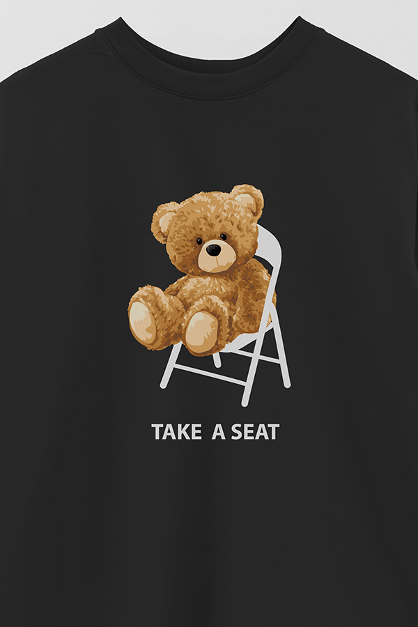 REMERA OVER ESTAMPADA UNISEX TAKE A SEAT