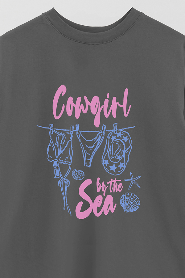 REMERA OVER ESTAMPADA WT BY THE SEA