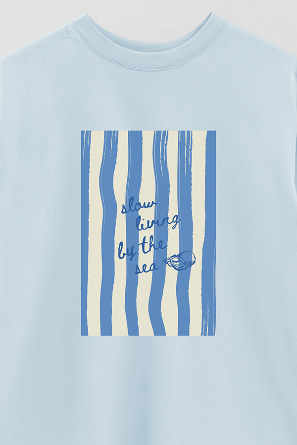 REMERA OVER ESTAMPADA STP SLOW LIVING