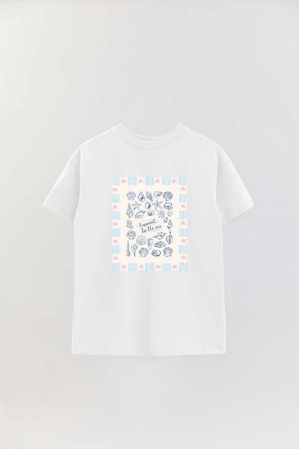 REMERA OVER ESTAMPADA STP HAPPIEST BY THE SEA