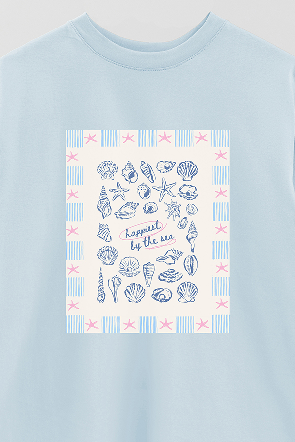 REMERA OVER ESTAMPADA STP HAPPIEST BY THE SEA