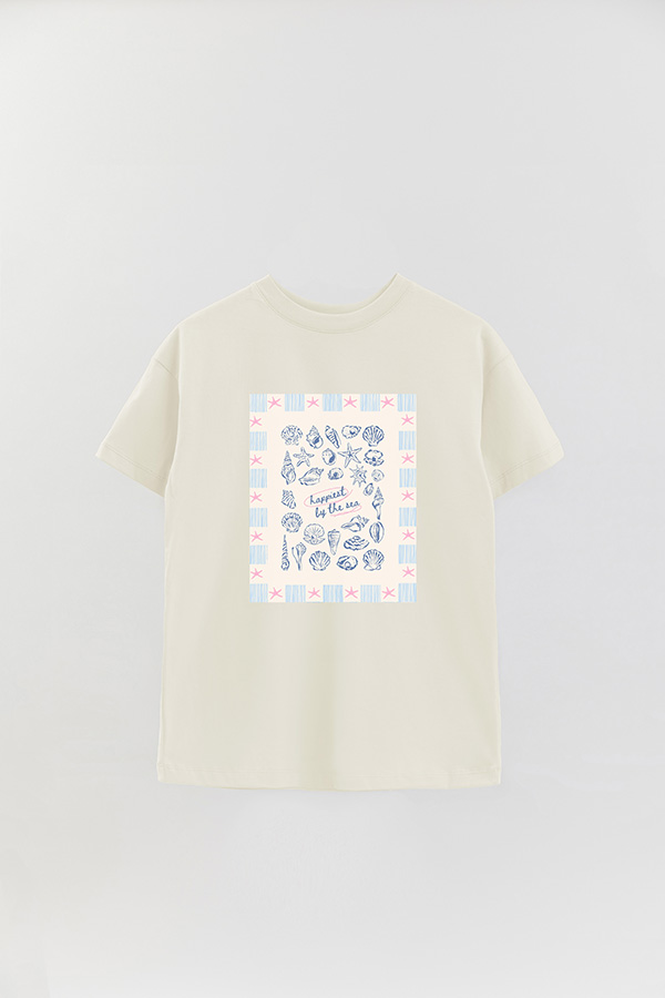REMERA OVER ESTAMPADA STP HAPPIEST BY THE SEA