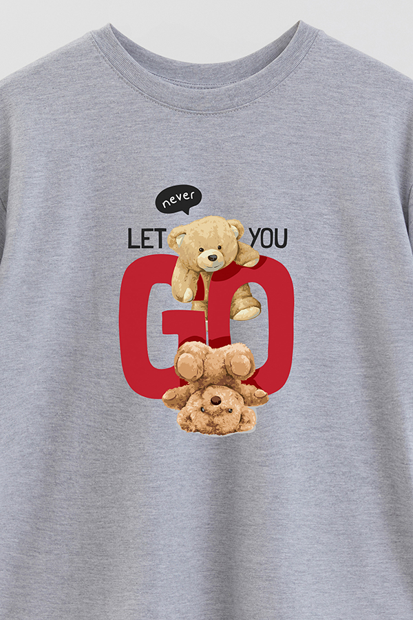 REMERA OVER ESTAMPADA UNISEX NEVER LET YOU GO