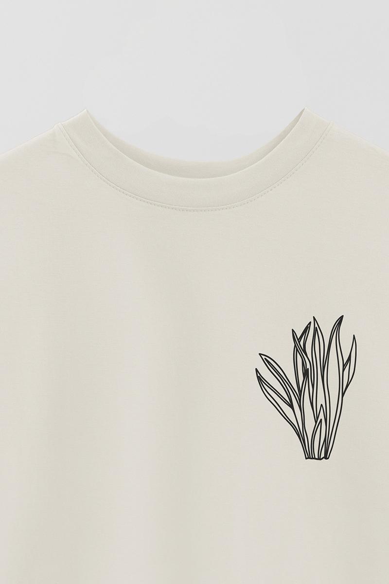 REMERA OVER ESTAMPADA UNISEX SUEGRA