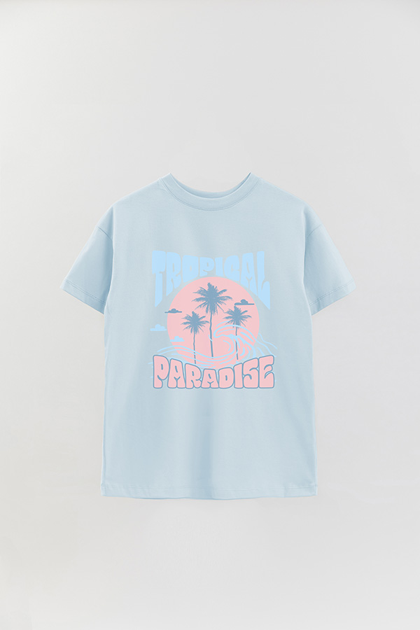 REMERA OVER ESTAMPADA TROPICAL PARADISE PASTEL