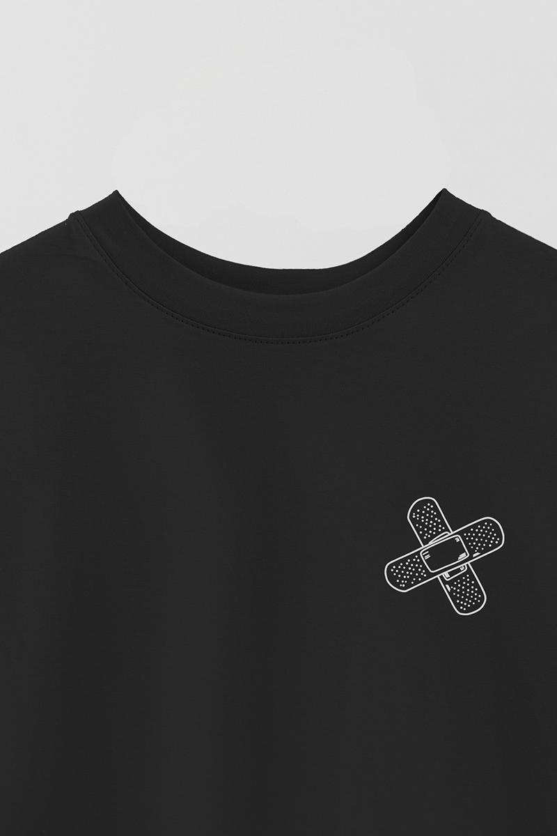 REMERA OVER ESTAMPADA UNISEX BANDAIDS