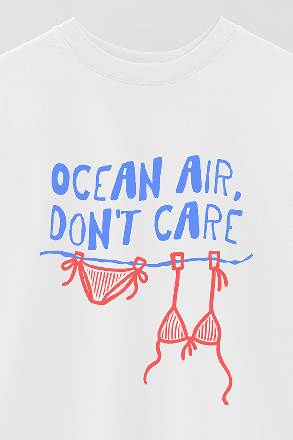 REMERA OVER ESTAMPADA OCEAN AIR, DON'T CARE
