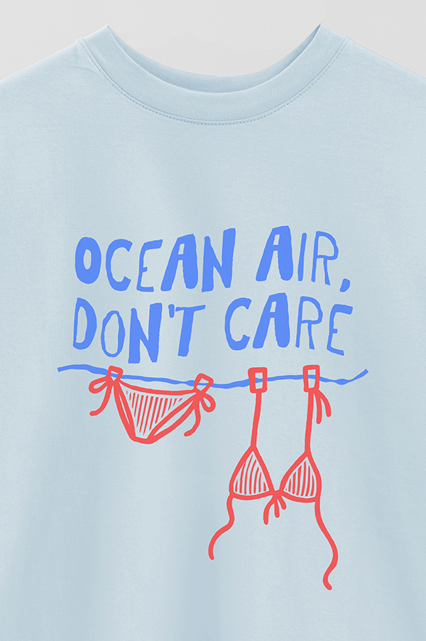 REMERA OVER ESTAMPADA OCEAN AIR, DON'T CARE