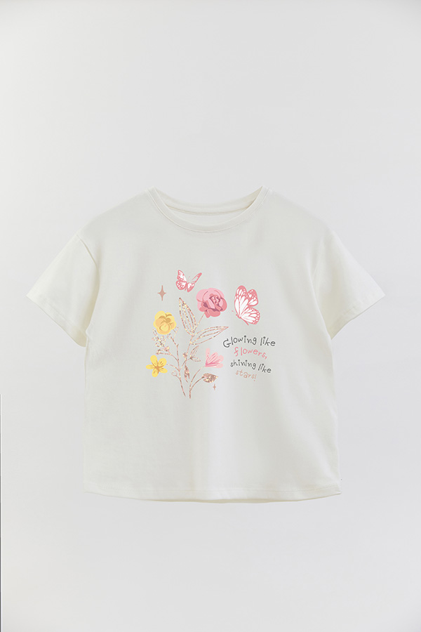 REMERA GIRL OVER GLOWING LIKE FLOWERS
