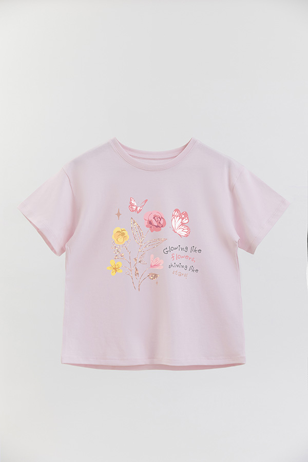 REMERA GIRL OVER GLOWING LIKE FLOWERS