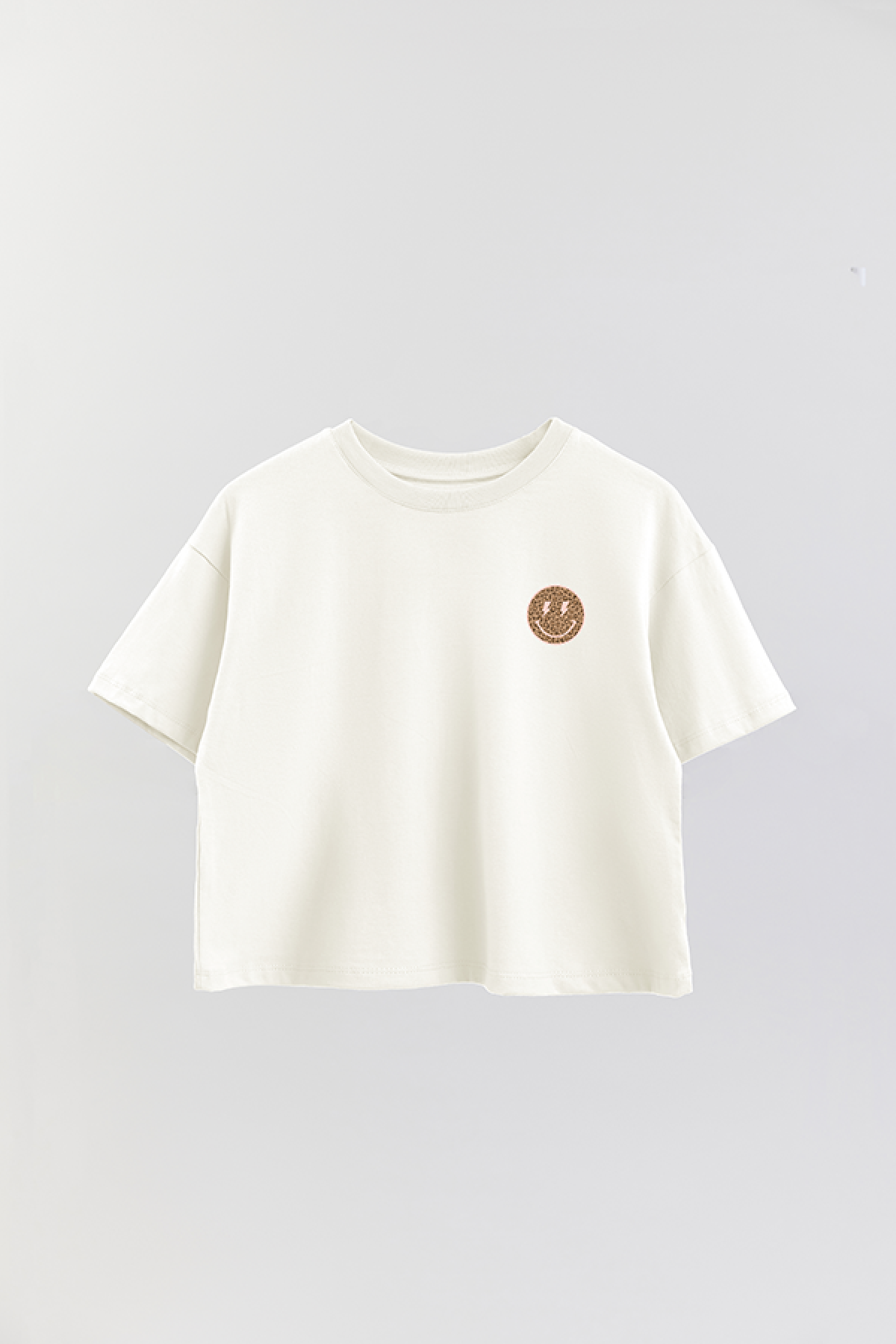 REMERA CROP ESTAMPADA WCV SMILEY LEOPARD