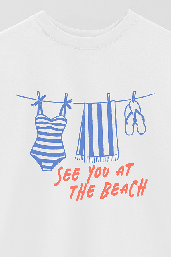 REMERA OVER ESTAMPADA SEE YOU AT THE BEACH