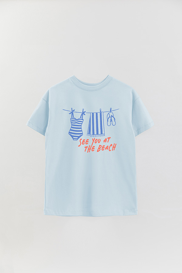 REMERA OVER ESTAMPADA SEE YOU AT THE BEACH