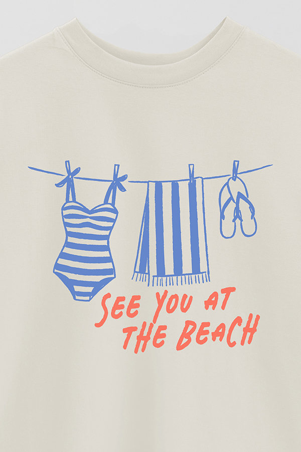 REMERA OVER ESTAMPADA SEE YOU AT THE BEACH