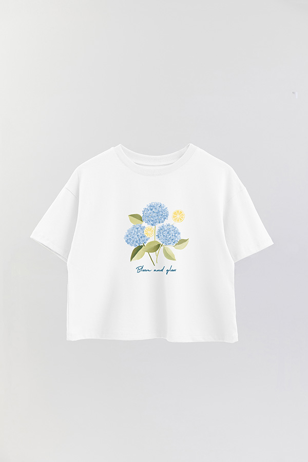 REMERA CROP ESTAMPADA COASTAL BLOOM AND GLOW