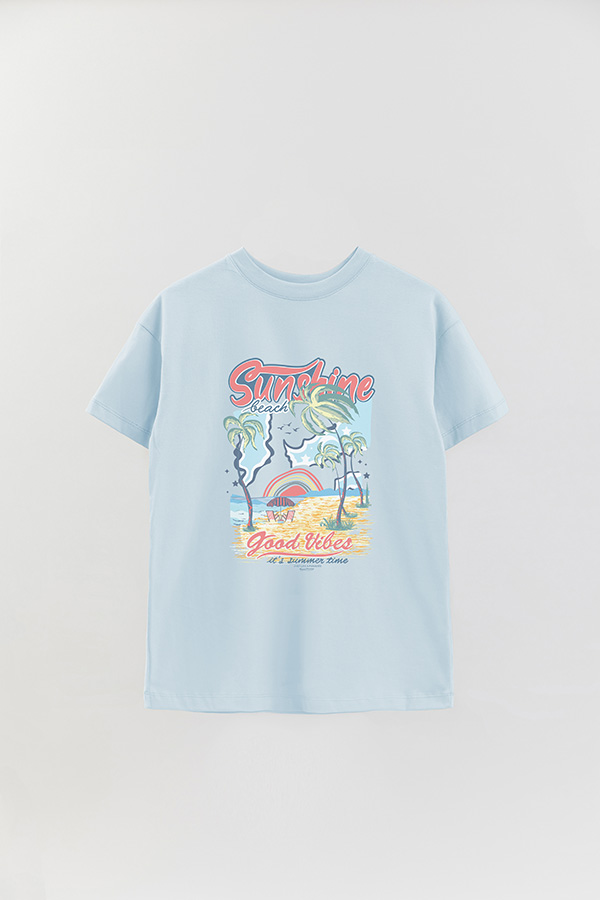 REMERA OVER ESTAMPADA TROPICAL ISLAND