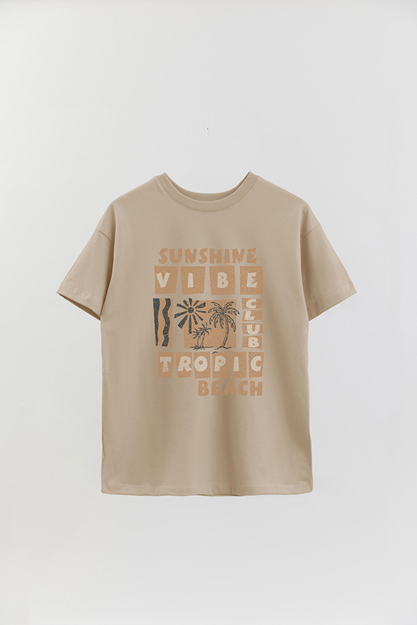 REMERA OVER ESTAMPADA TROPIC BEACH