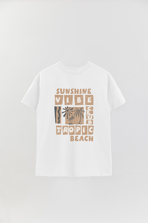 REMERA OVER ESTAMPADA TROPIC BEACH
