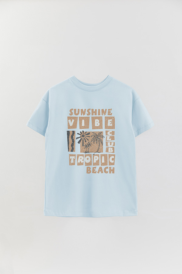 REMERA OVER ESTAMPADA TROPIC BEACH