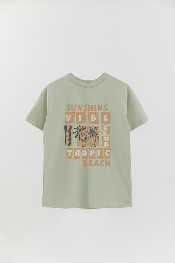 REMERA OVER ESTAMPADA TROPIC BEACH