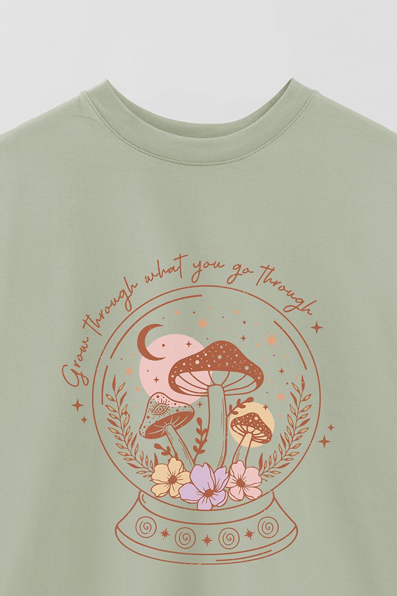 REMERA OVER ESTAMPADA MST GROW THROUGH WHAT YOU GO THROUGH