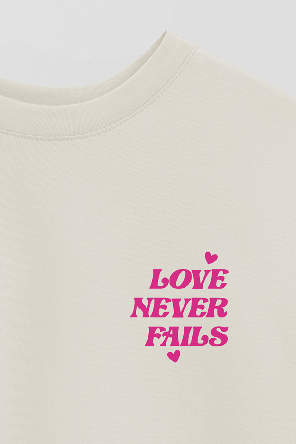REMERA OVER ESTAMPADA WCV LOVE NEVER FAILS