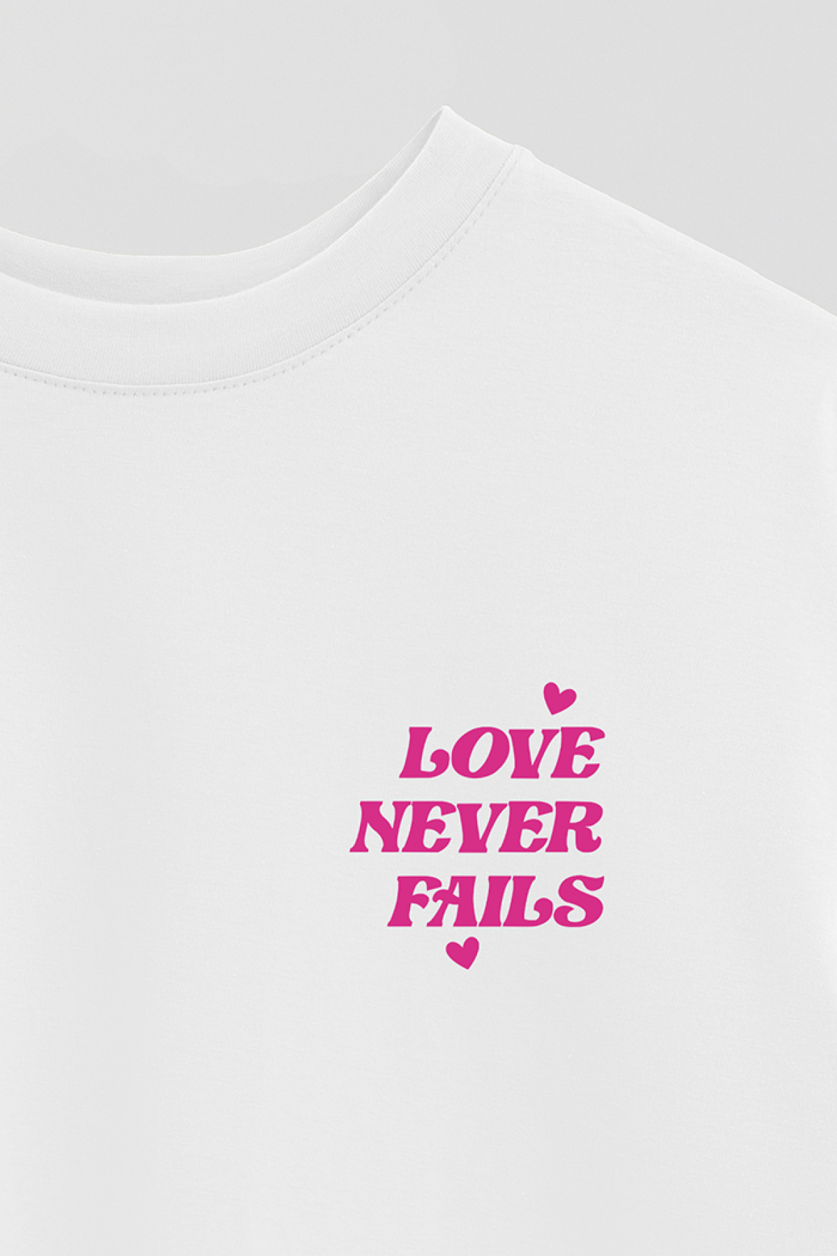 REMERA OVER ESTAMPADA WCV LOVE NEVER FAILS