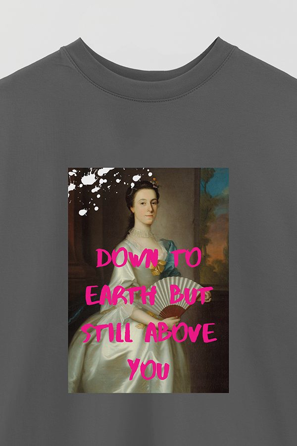 REMERA OVER ESTAMPADA ART COLLECTION 100 DOWN TO EARTH