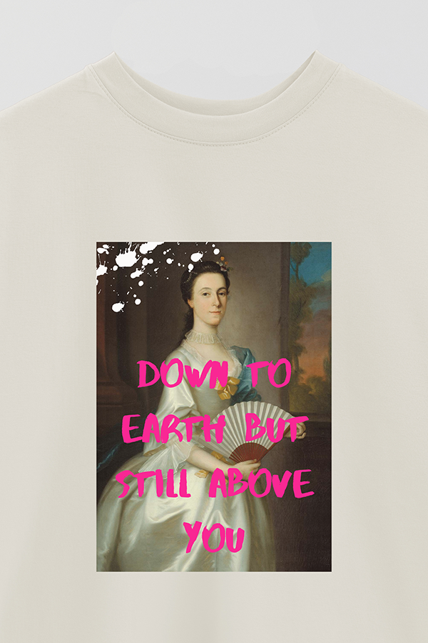 REMERA OVER ESTAMPADA ART COLLECTION 100 DOWN TO EARTH