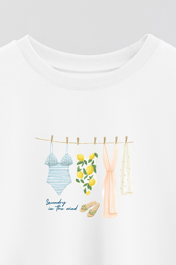 REMERA CROP ESTAMPADA COASTAL LAUNDRY IN THE WINDS