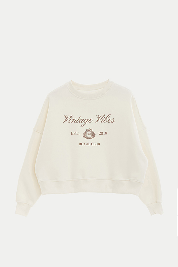 BUZO CROP ESTAMPADO VARSITY VINTAGE VIBES