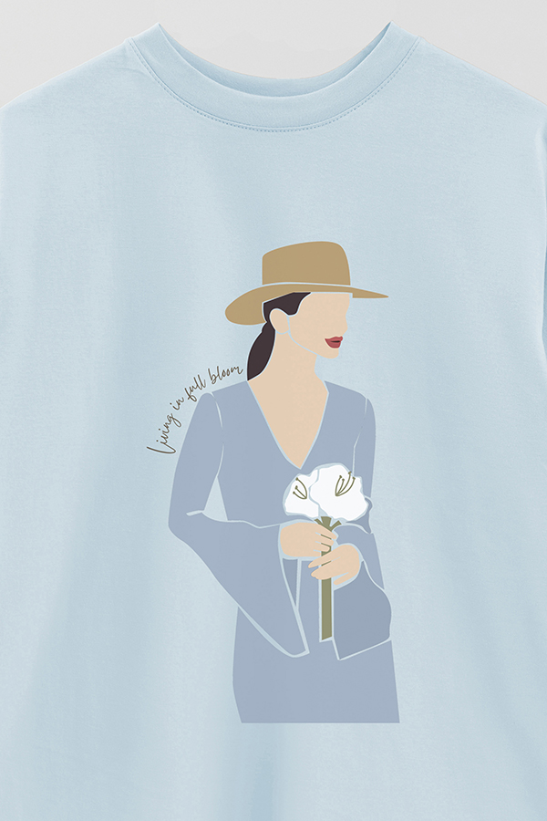 REMERA OVER ESTAMPADA LIVING IN FULL BLOOM