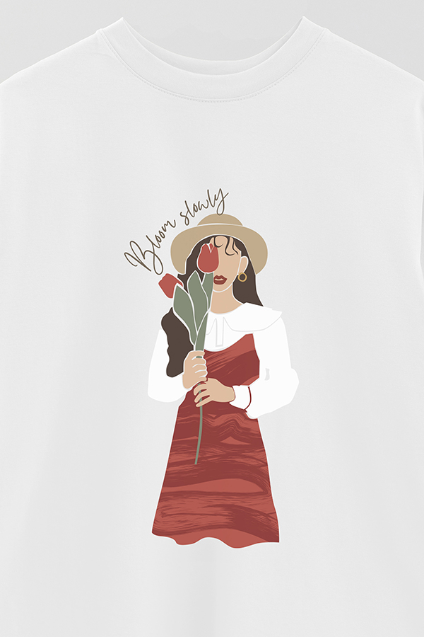 REMERA OVER ESTAMPADA BLOOM SLOWLY